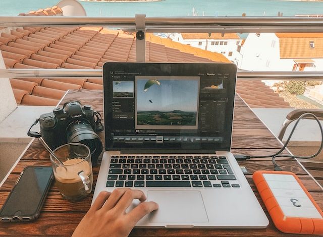 Remote work picture shows team collaborating remotely using laptops and video chat. Flexible, efficient, and productive remote work solution